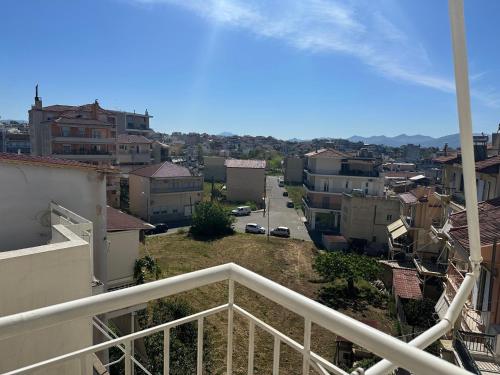 a view of a city from a balcony at FK Maison in Agrinio