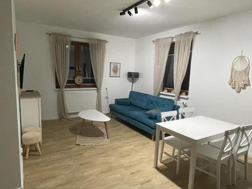 Χώρος καθιστικού στο Apartamenty Mazury