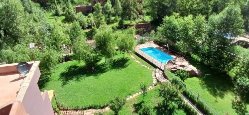 an aerial view of a yard with a swimming pool at Country homes in Ourika