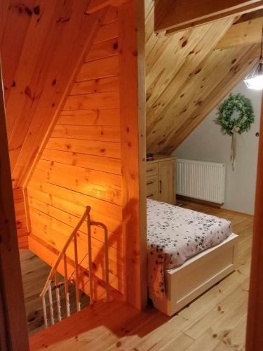 Postel nebo postele na pokoji v ubytování Zakątek na Mazurach II