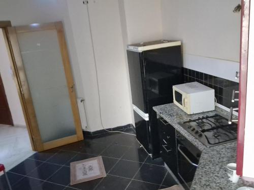 Cuisine ou kitchenette dans l'établissement Tom II Expresse Médical
