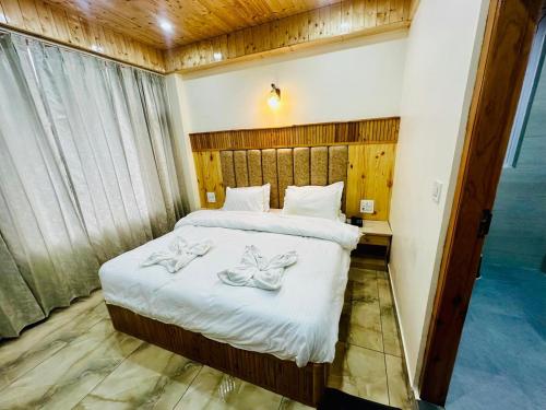 Cama ou camas em um quarto em The Exotic Retreat