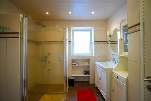 Ванна кімната в Gemütliche Wohnung im Herrenhaus
