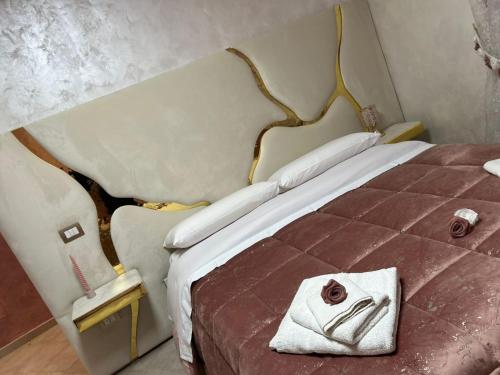 Un pat sau paturi într-o cameră la VILLA MULINO