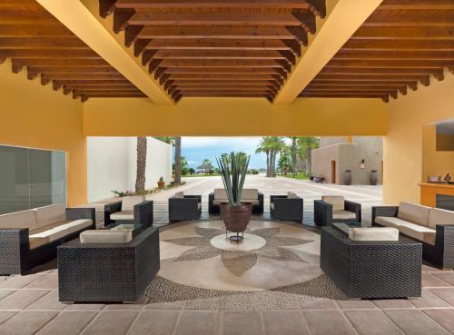 a living room with couches and a table at Loreto Bay Golf & Sea at Baja in Loreto