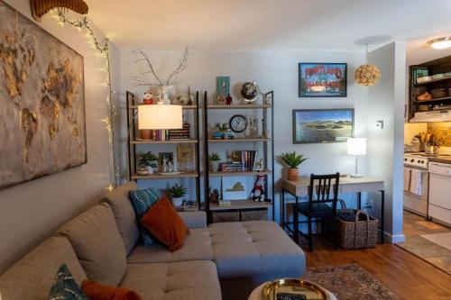 a living room with a couch and a table at 1 BDR Condo in the Heart of Breck Walk to Gondola in Breckenridge