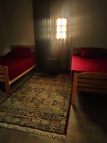 Una cama o camas en una habitación de Ahmed house