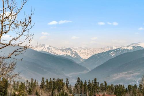a view of a mountain range with snow covered mountains at Cozy 2BR with Great Views Near Trails in Silverthorne