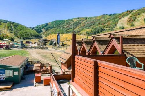 an overhead view of a building with mountains in the background at Breathtaking Mountain Views Ski In Out 2BR Condo in Park City