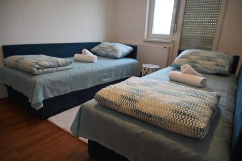 Postel nebo postele na pokoji v ubytování Tešić Seoska Idila