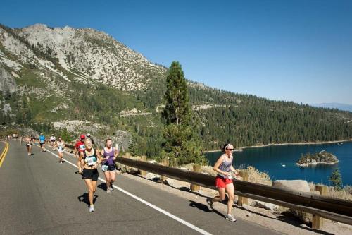 a group of people running down a road at Northstar Ski in Ski out 2BR Condo in Truckee