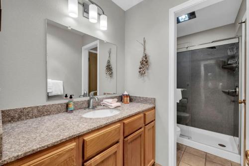 a bathroom with a sink and a shower at 1BD Near Canyons Village on FREE Shuttle Line in Park City