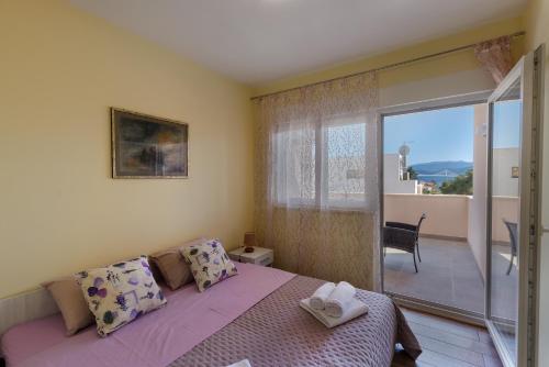 Ένα ή περισσότερα κρεβάτια σε δωμάτιο στο Providenca