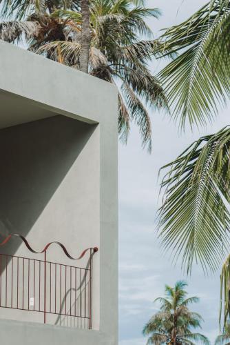 Luau Hotelにあるバルコニーまたはテラス