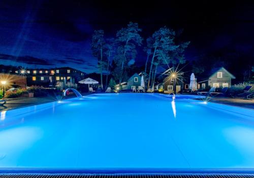 Bazén v ubytování APARTAMENTY przy plaży z basenem z podgrzewaną wodą i mini SPA - Ośrodek Kolonijno-Wczasowy Mewa nebo v jeho okolí