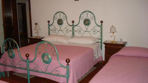 Cama o camas de una habitación en B&B Gio Franziscu