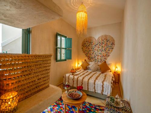 Letto o letti in una camera di Riad dada Messouda spa