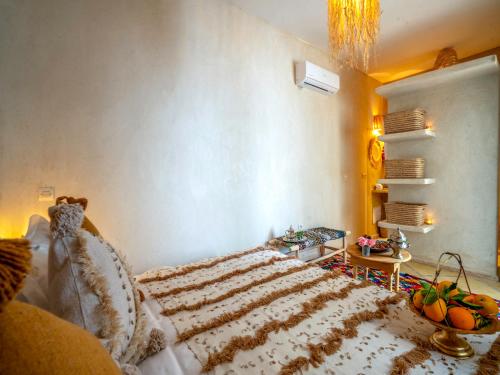 Letto o letti in una camera di Riad dada Messouda spa