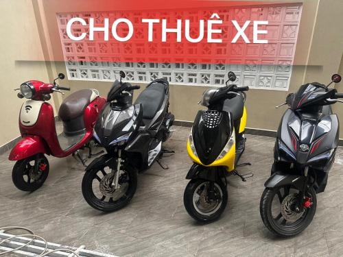 a group of three scooters parked in a store at Halidao Homestay in Hai Phong