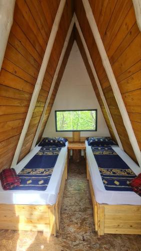 Postel nebo postele na pokoji v ubytování Cabin 3 Hill Station