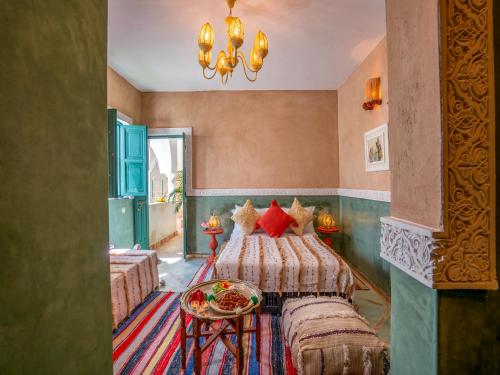 Letto o letti in una camera di Riad dada Messouda spa