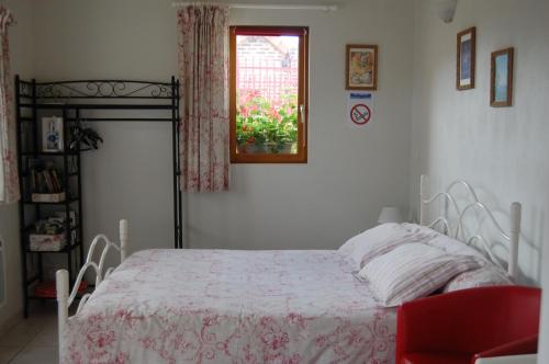 Postel nebo postele na pokoji v ubytování Au Clos du Logis