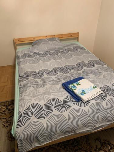 Postel nebo postele na pokoji v ubytování Jakomini-Wohnung