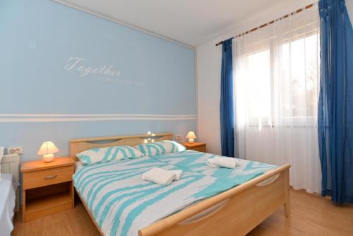 Katil atau katil-katil dalam bilik di Ferienwohnung für 5 Personen ca 51 qm in Bale, Istrien Istrische Riviera