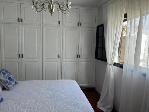 Postel nebo postele na pokoji v ubytování Casa LuÁn