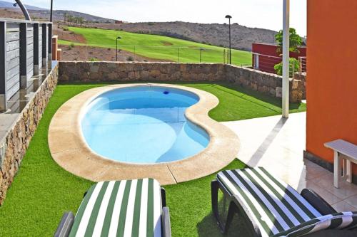 Vaade basseinile majutusasutuses Ferienhaus mit Privatpool für 4 Personen ca 103 qm in Las Crucitas, Gran Canaria Südküste Gran Canaria või selle lähedal