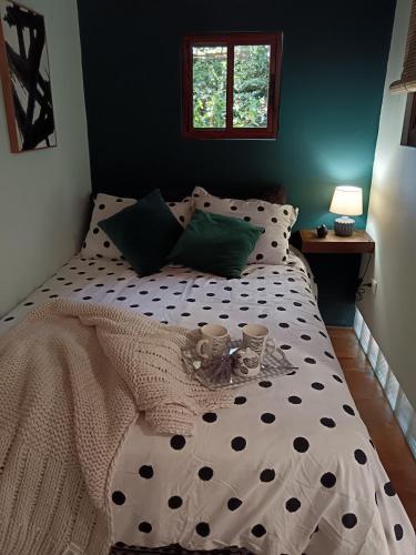 Postel nebo postele na pokoji v ubytování La Casita Verde
