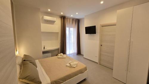 Postel nebo postele na pokoji v ubytování Marieclaire B&B