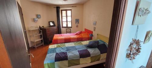 Katil atau katil-katil dalam bilik di Maison de village sur la citadelle de Calvi