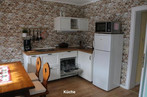 Kuchyň nebo kuchyňský kout v ubytování Ferienwohnung Katharina II