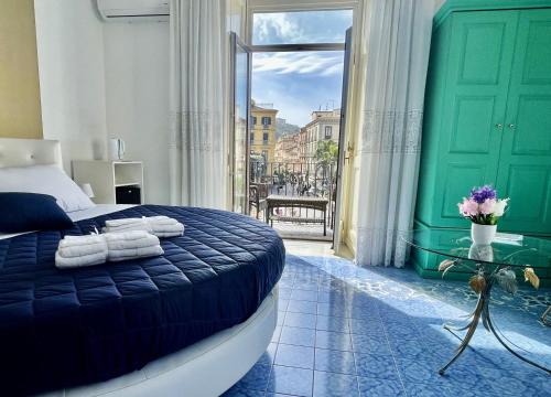 Postel nebo postele na pokoji v ubytování Ambasciata Sorrento Relais