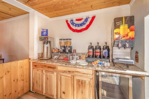 a kitchen with a counter top and a refrigerator at Big Bear Lake Front Lodge in Big Bear Lake