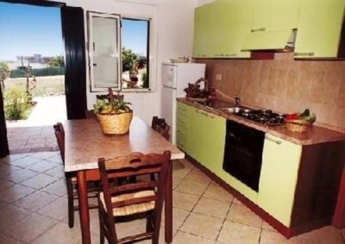 Ferienwohnung für 4 Personen ca 55 qm in Santa Maria Di Ricadi, Kalabrien Provinz Vibo Valentia - b57904 tesisinde mutfak veya mini mutfak