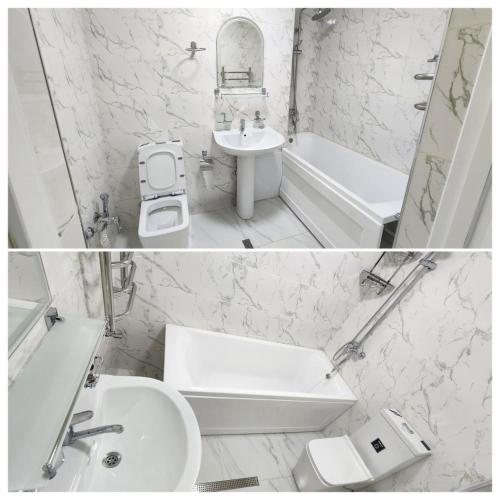 La salle de bains blanche est pourvue d'un lavabo, d'une baignoire et de toilettes. dans l'établissement Апартамент 2, à Samarcande