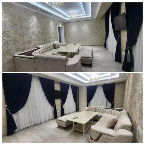 - un salon avec un canapé et une table dans l'établissement Апартамент 2, à Samarcande