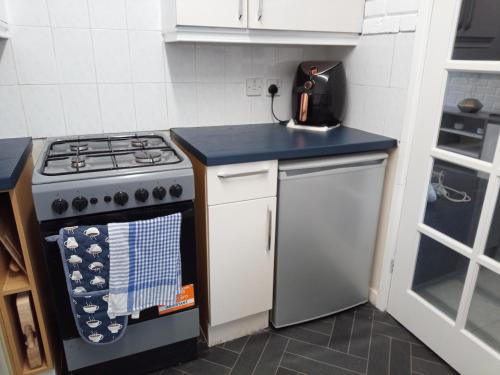 Una cocina o zona de cocina en SEVENOAKS