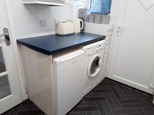 Una cocina o zona de cocina en SEVENOAKS
