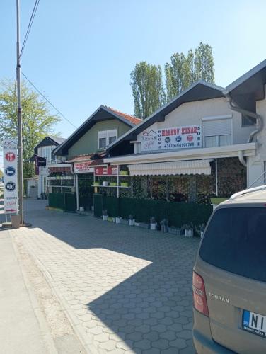 a car parked in front of a building at Marko Konak in Niš