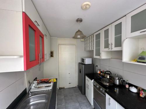 Η κουζίνα ή μικρή κουζίνα στο 595 Departamento en Chorrillos