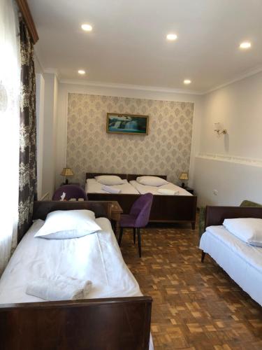 Ein Bett oder Betten in einem Zimmer der Unterkunft Guest House Anahit Ijevan