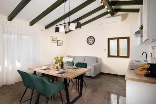 Modern stone House with flowers & playground