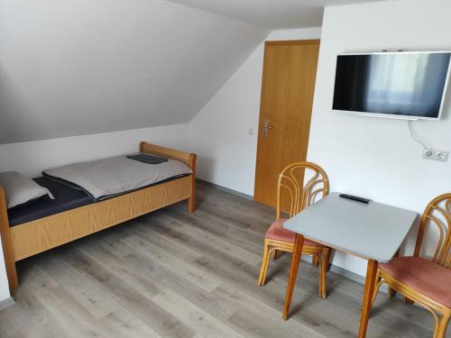 Postel nebo postele na pokoji v ubytování Apartments zum stillen Winkel