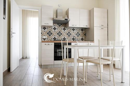 Kuchyň nebo kuchyňský kout v ubytování Domus Marina - Atlantico Apartment