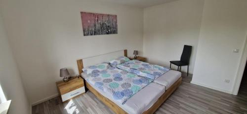 Postel nebo postele na pokoji v ubytování Ferienwohnung am Panoramaweg