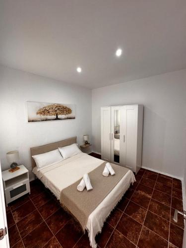 Ένα ή περισσότερα κρεβάτια σε δωμάτιο στο NAHMAR APARTAMENTO