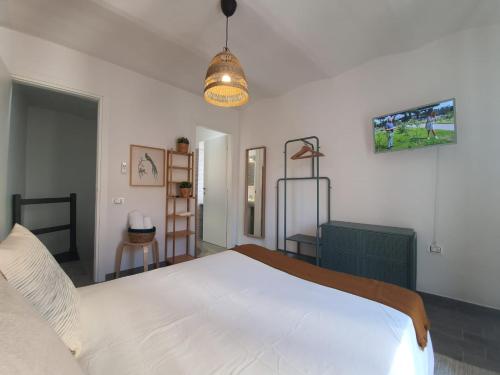 Letto o letti in una camera di CASA DINA - Fondi Vertice Rooms